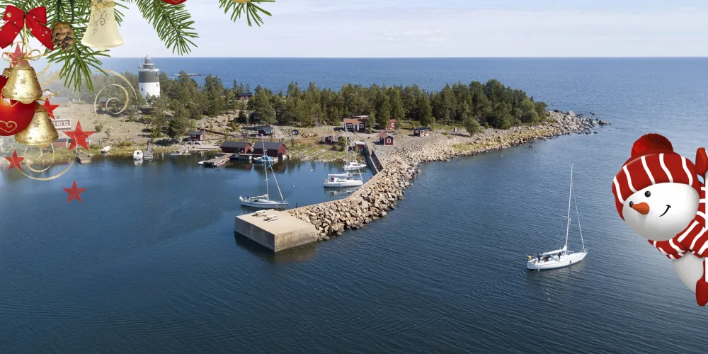 Julkort med en drönarbild över Storjungfrun och fyrhamnen